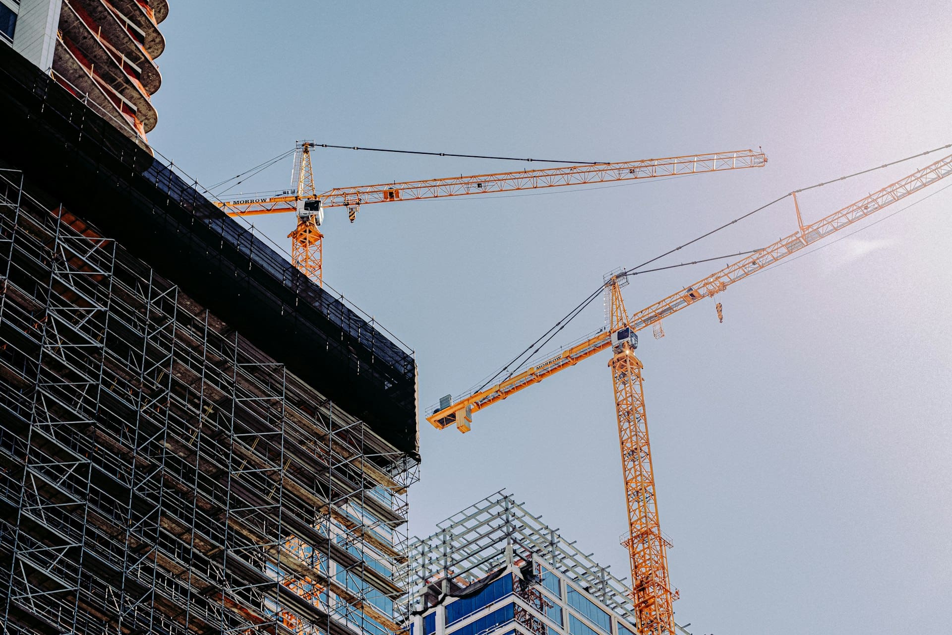 Tower crane over a residential construction site